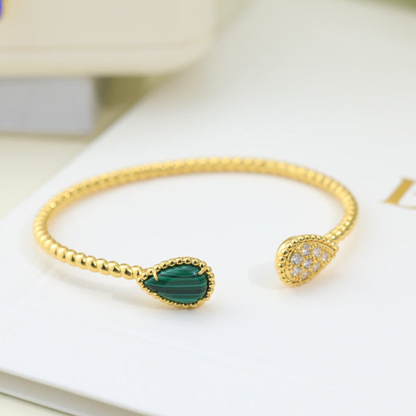 BRACCIALE APERTO IN ORO CON MALACHITE E DIAMANTI BOHEME