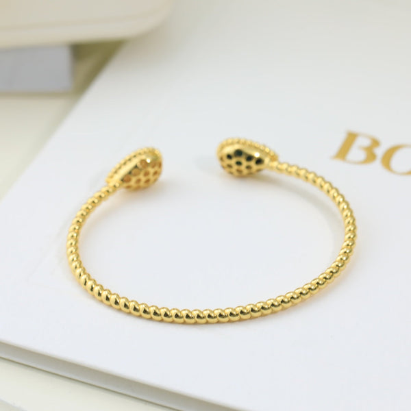 BRACCIALE APERTO IN ORO CON MALACHITE E DIAMANTI BOHEME