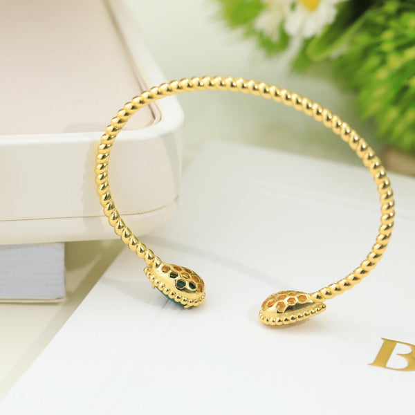 BRACCIALE APERTO IN ORO CON MALACHITE E DIAMANTI BOHEME
