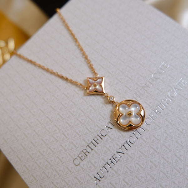 COLLANA IN ORO ROSA CON MOTIVO STELLA E SOLE BIANCO MOP 2 