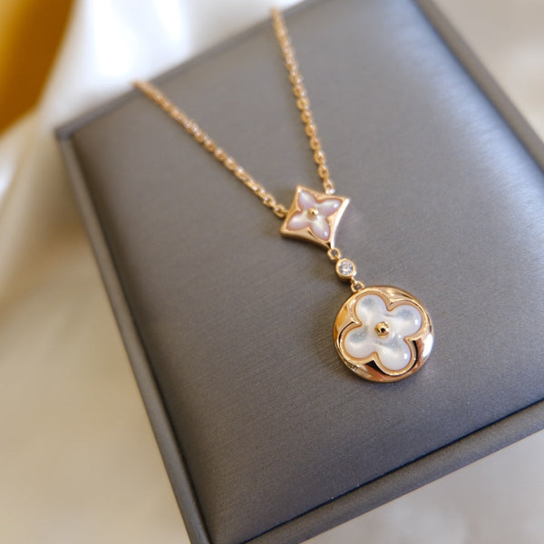 COLLANA IN ORO ROSA CON MOTIVO STELLA E SOLE BIANCO MOP 2 