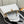 CAPUCINES MM 31 WHITE TAURILLON GOLD HARDWARE