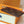 PORTA CARTE CON CIONDOLO IN TELA MONOGRAMMA MARRONE