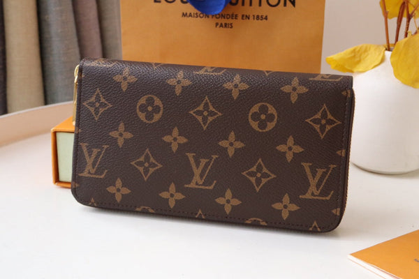 PORTAFOGLIO VIVIENNE ZIPPY 9.5 MONOGRAM CANVAS
