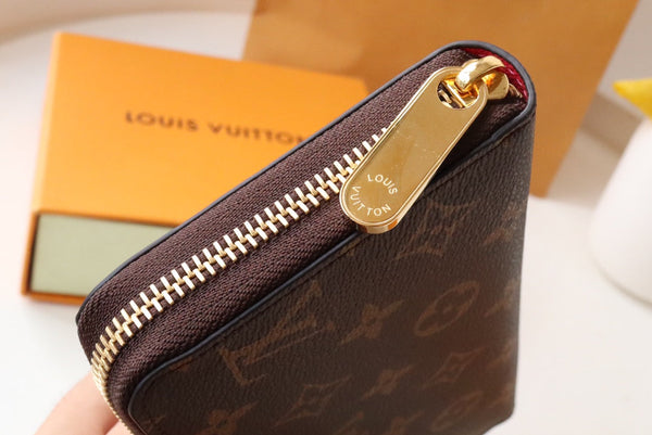 PORTAFOGLIO VIVIENNE ZIPPY 9.5 MONOGRAM CANVAS