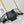 NOE PURSE 11.5 NANO CHARM BLACK CALFSKIN