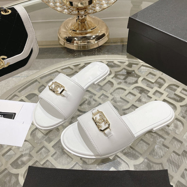 Mules in pelle di vitello lucida bianca