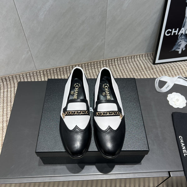 CC 25S Round Toe Chain Loafers in Black and White Cowhide 442533
