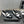 CC 25S Round Toe Chain Loafers in Black and White Cowhide 442533