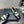 CC 25S Round Toe Chain Loafers in Black and White Cowhide 442533