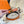 H GARDEN PARTY BELT 24MM GOLD BUCKLE & REVERSIBLE ORANGE AND BLACK LEATHER