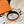 H GARDEN PARTY BELT 24MM GOLD BUCKLE & REVERSIBLE ORANGE AND BLACK LEATHER