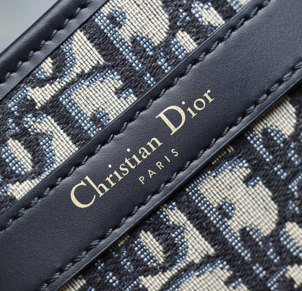 MONTAIGNE MEDIUM 24 BUCKET BAG IN BLUE OBLIQUE JACQUARD CALFSKIN