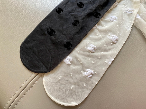 CC polka dot butterfly tiny lettering fishnet pantyhose