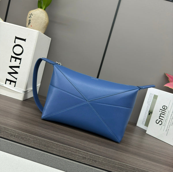 Sac à main Loewe Puzzle Fold 22 cm en cuir de veau brillant bleu 274150