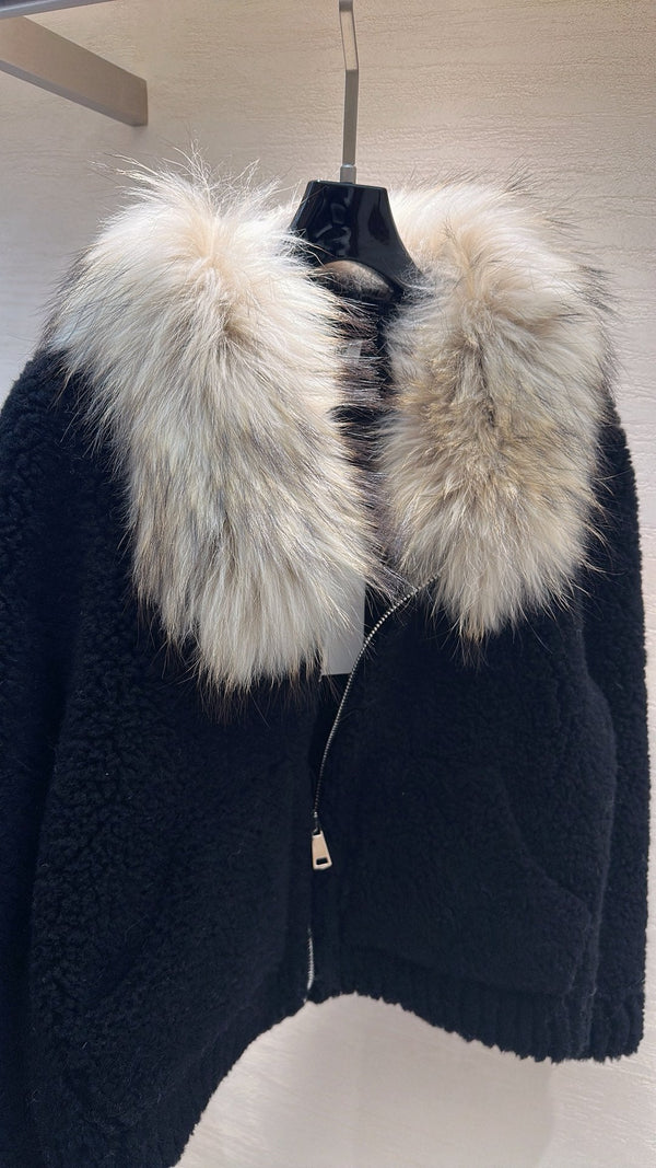 Manteau CELINE en peau lainée noire 333249