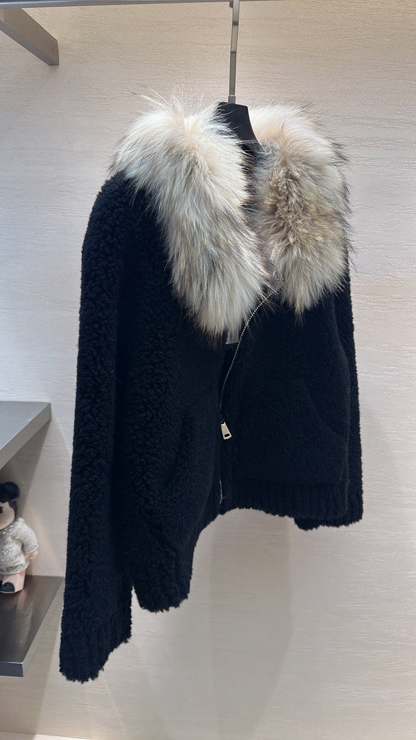 Manteau CELINE en peau lainée noire 333249