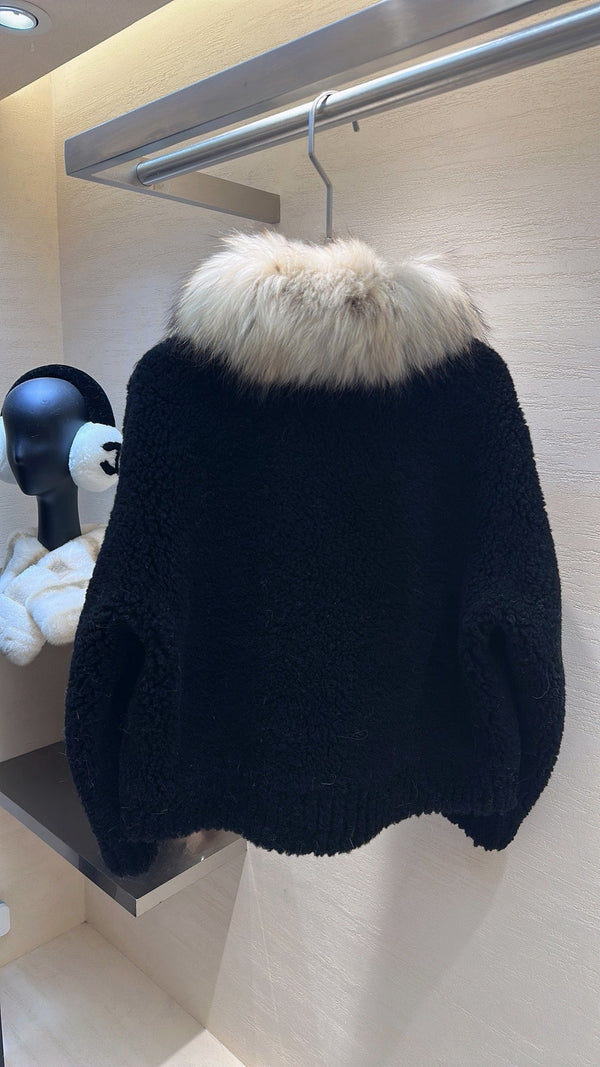 Manteau CELINE en peau lainée noire 333249