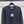 PULL EN MAILLE NOIR LOGO CHANEL 26 335407