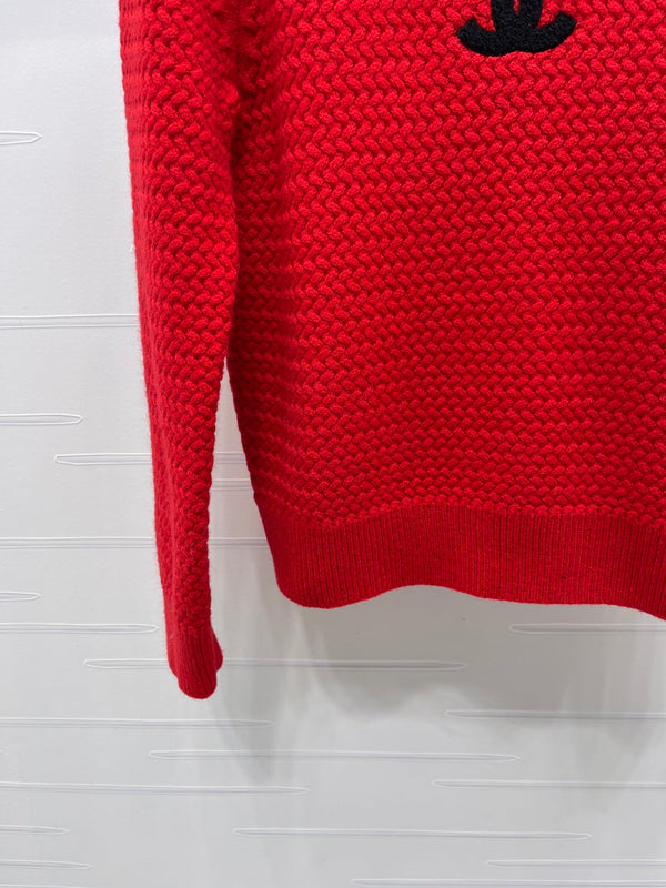 PULL TRICOTÉ ROUGE AVEC LOGO CHANEL 26 335405