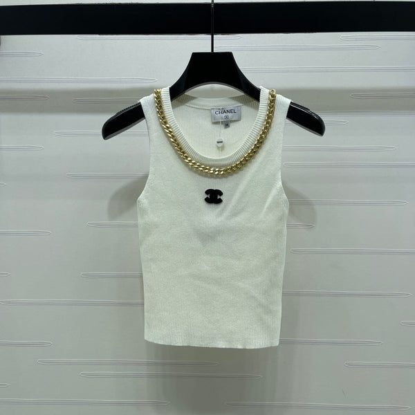 GILET EN MAILLE TRICOTÉE AVEC CHAÎNE CHANEL 26 EN LAINE NOIRE 335389