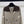 CHANEL CARDIGAN BRUN À MANCHES LONGUES ET MOTIF LOSANGES 335385