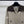 CHANEL CARDIGAN BRUN À MANCHES LONGUES ET MOTIF LOSANGES 335385