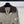CHANEL CARDIGAN BRUN À MANCHES LONGUES ET MOTIF LOSANGES 335385