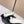 Ballerines Chanel en agneau blanc et noir à logo CC entrelacé 591389