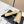 Ballerines Chanel en agneau beiges et noires avec logo CC entrelacé 591390