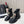 Bottes courtes Chanel CC Combat à perles noires en cuir de veau 597894