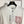 T-shirt à manches longues et col rond Chanel avec blocs de couleurs et rayures, et poche