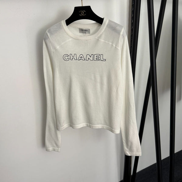 T-shirt en maille à manches longues Chanel avec logo Chanel brodé