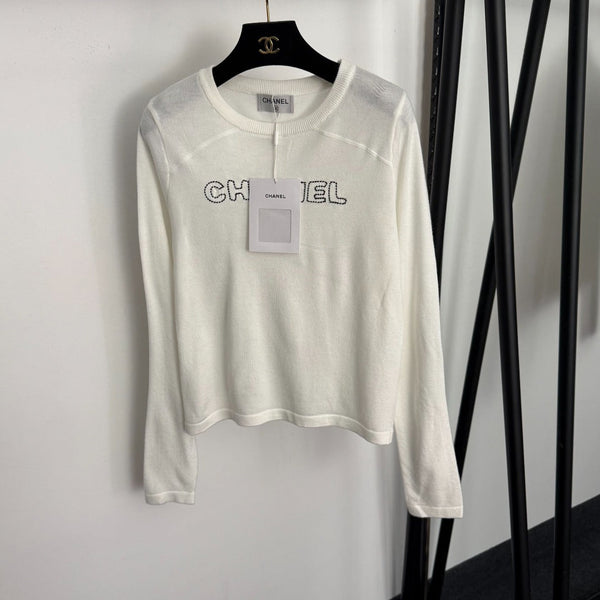 T-shirt en maille à manches longues Chanel avec logo Chanel brodé