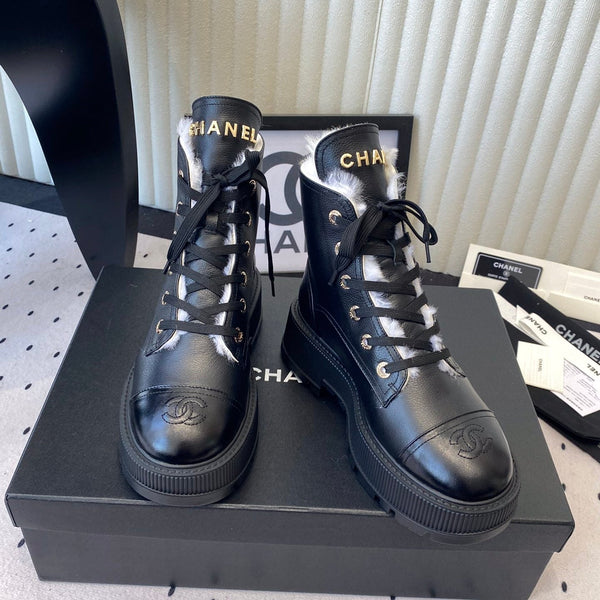 Bottes cloutées plateforme en cuir noir doublées fourrure CC 611709