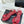 Sandales Chanel 26C à talon carré avec nœud chaîne, rouges, en cuir de vachette 615987