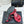 Sandales Chanel 26C à talon carré avec nœud chaîne, rouges, en cuir de vachette 615987