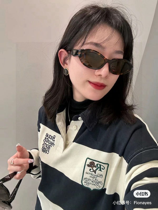 Lunettes de soleil Prada 18