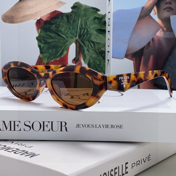 Lunettes de soleil Prada 18