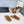 ALAIA 25 Fur Mule Slipper Camel in Lambswool 629517