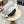 Chapeau Chanel en paille blanche et noire avec un ruban en soie blanche 192276
