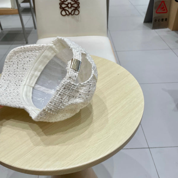 Casquette de baseball Chanel en toile blanc cassé ornée de perles 192119