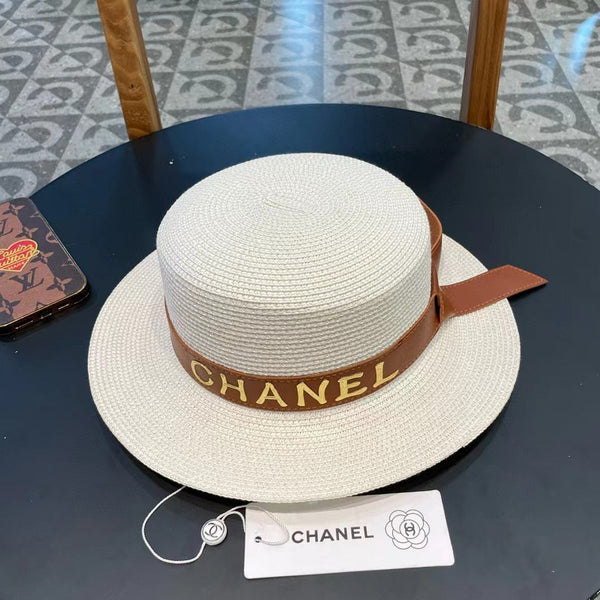 Chapeau tressé Chanel avec bride en cuir blanc en coton 205615