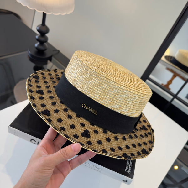 Chapeau Chanel en paille de raphia beige et noir 205379