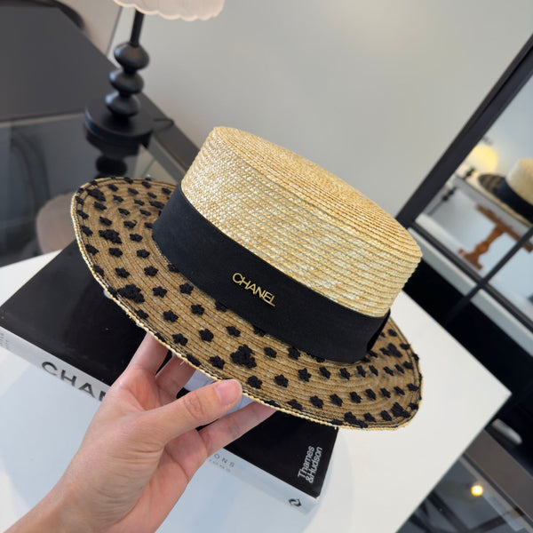 Chapeau Chanel en paille de raphia beige et noir 205379