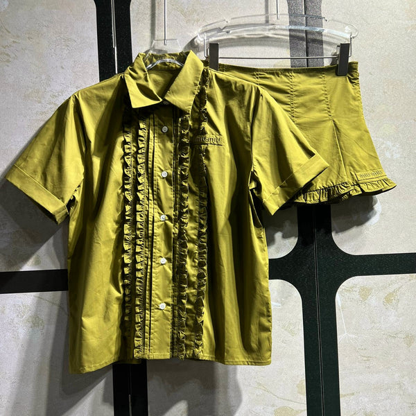 Chemisier à manches courtes vert à volants et jupe en coton Miu Miu 250945
