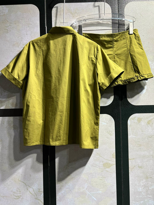 Chemisier à manches courtes vert à volants et jupe en coton Miu Miu 250945