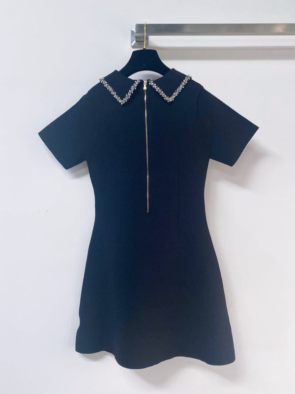 Robe Chanel manches courtes noire en polyester 262507