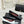 Ballerines plates CC 26S Double C Patchwork Noir Blanc en cuir de vachette 706366