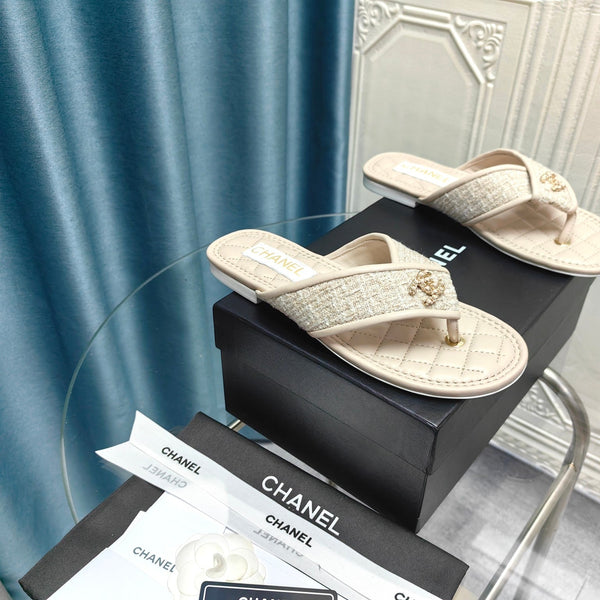 Chanel 26P Flip-Flops Cream in Woven 712314